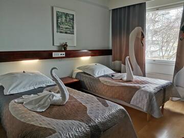 Фото номера Двухместный номер с 2 отдельными кроватями Отель Hotel Kemijärvi г. Кемиярви 4